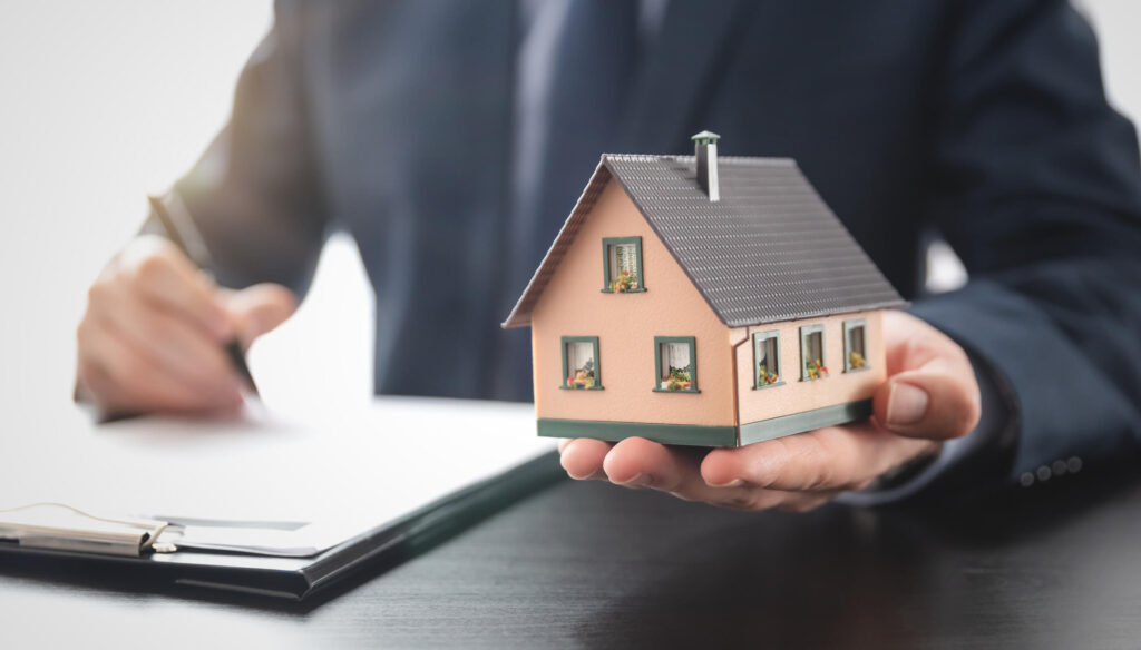 Consider Hiring a Columbia Property Manager to Help Collect Rent Columbia property manager holding home