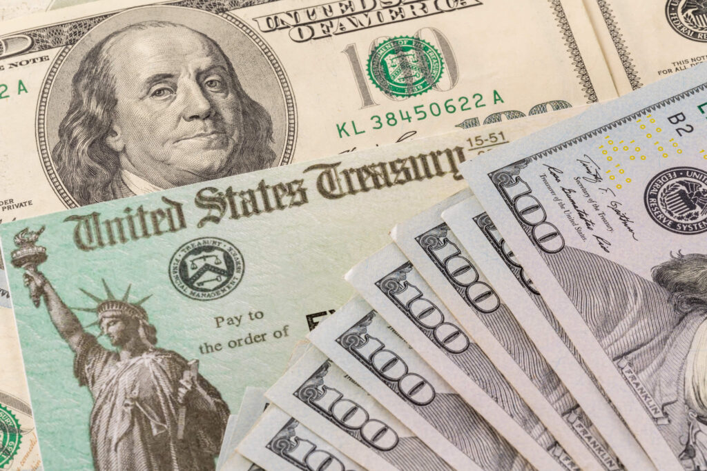 Learn how to calculate cash on cash return with your rental property. U.S. dollars on top of check and more U.S. dollars